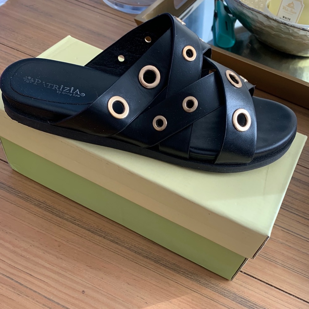 Black and gold sandals from “PATRIZIA”